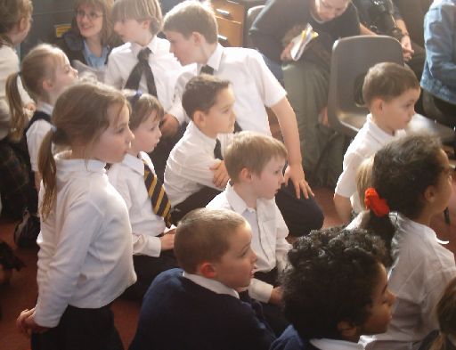 smart Gaelic school 
                  children interact